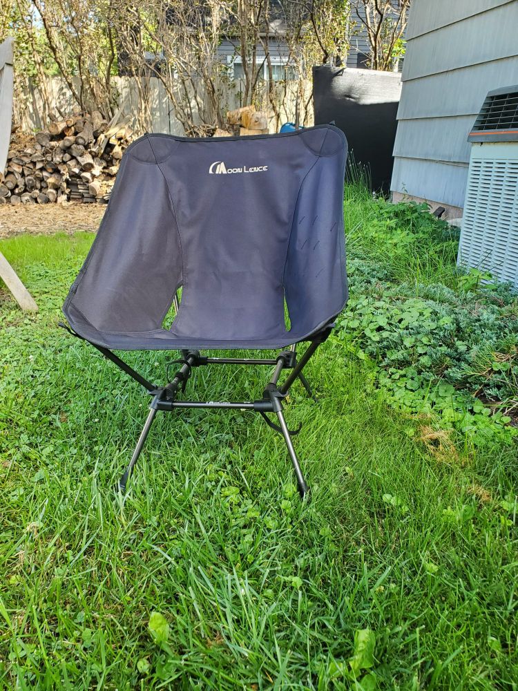 Low canvas camp chair on aluminum frame.