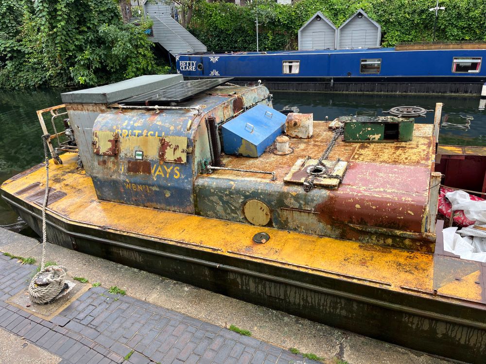 Rusted Metal canal barge and hull and cabin