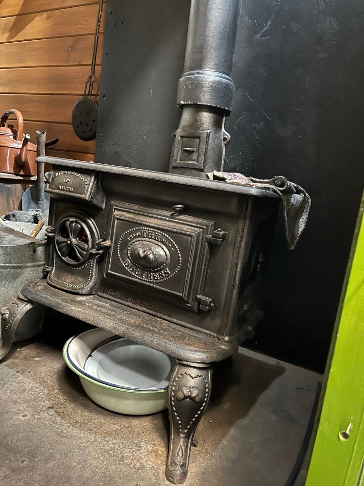 “I was Built by Bomford & Evershed Ltd
around 1910.
In years gone by, wherever a large road repair was being carried out, I would have been a common sight.
I'm not luxurious but I am quite cosy.
I was kept warm by the cooking range, which stayed alight even in summer.
When people had no further use for living vans, we were towed back to our
depot yards and quietly forgotten or used for other purposes.
I was lucky. I was found in Mildenhall in Suffolk, and rescued and restored.” Text from museum display 