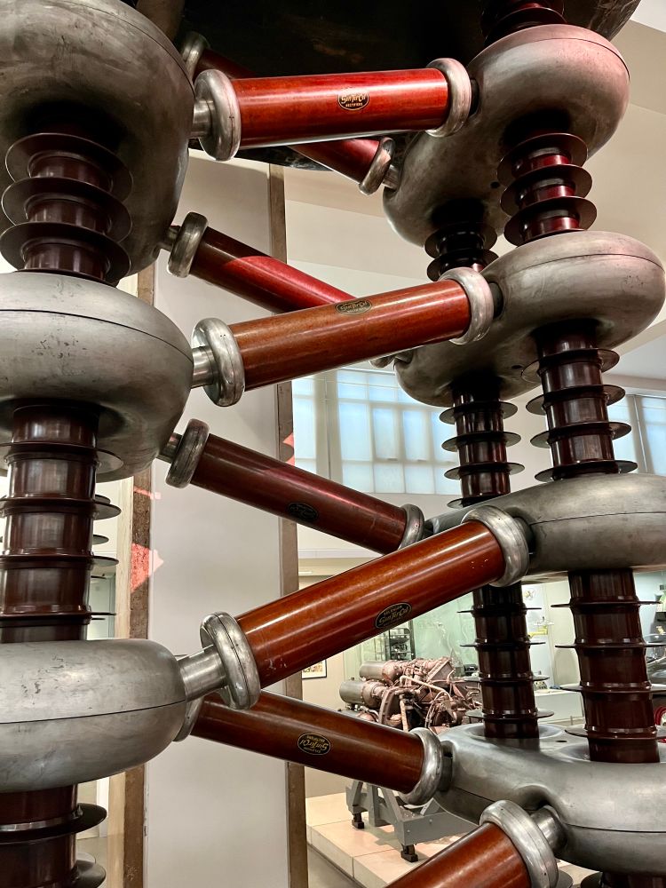 In the struggle to 'split the
atom', this machine accelerated
protons using high voltages.
Scientists smashed them into atomic nuclei and analysed the resulting fragments to determine atomic structure.
This technique, devised by John Cockcroft and Ernest Walton, at the Cavendish Laboratory in Cambridge in 1932, revealed new particles from within the nucleus.
As understanding of atomic structure and disintegration grew during the 1930s, it led directly to ideas for the atomic bomb and for atomic power. During the Second World War scientists used this machine to investigate the properties of
uranium and plutonium as acontribution to the
Manhattan Project which manufactured the first atomic bombs.
Source: The Cavendish Laboratory, Cambridge
Inv. 1982-1318

Text from museum display