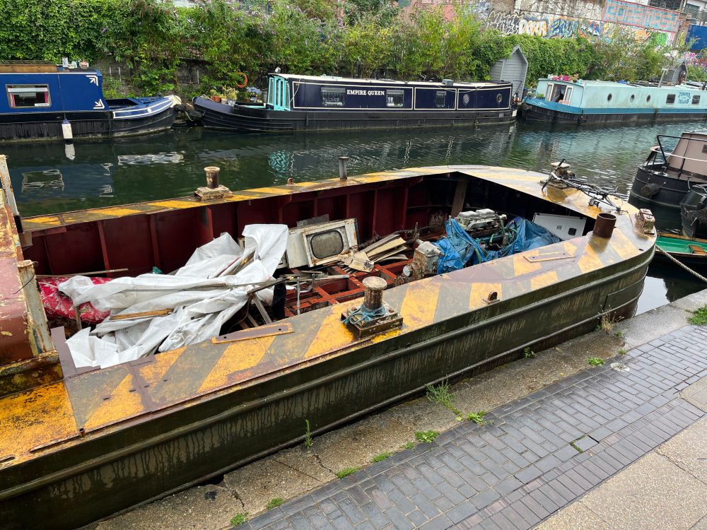 Rusted Metal canal barge and hull and cabin