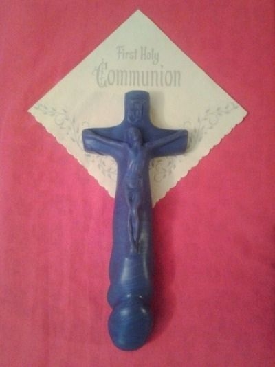 A silicone crucifix with a dildo as the bottom part of the cross