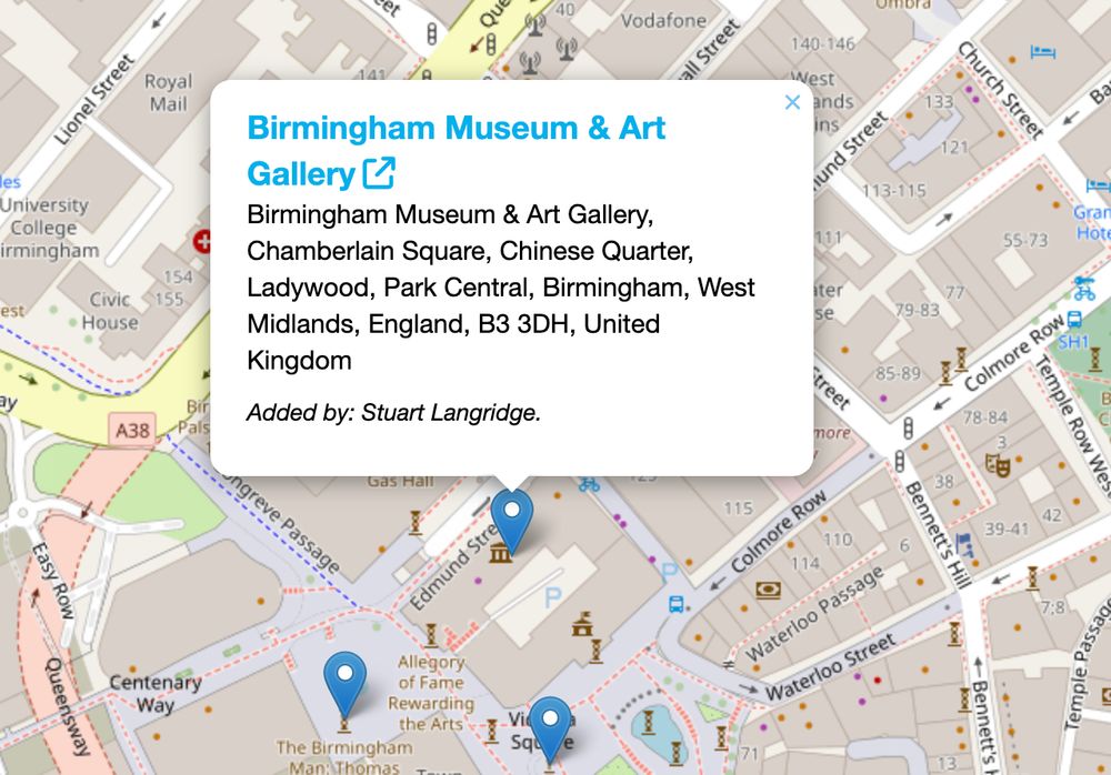 A cropped screenshot showing a map with some markers. One marker has been clicked, which now shows a popup dialog above it, containing the venue, link to their website, address, and credit of person who added it. In this case, "Birmingham Museum & Art Gallery, Birmingham Museum & Art Gallery, Chamberlain Square, Chinese Quarter, Ladywood, Park Central, Birmingham, West Midlands, England, B3 3DH, United Kingdom. Added by: Stuart Langridge."