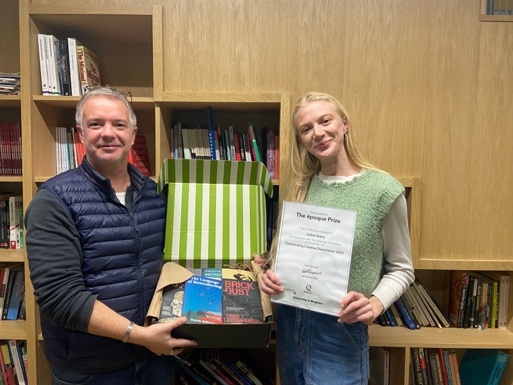 Seán presenting Isabel with her certificate and prize 