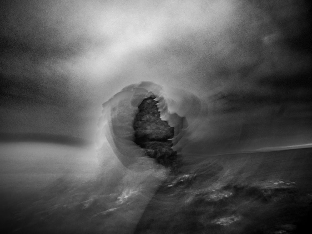 Black and white, intentional camera movement image of Dartmoor Tor