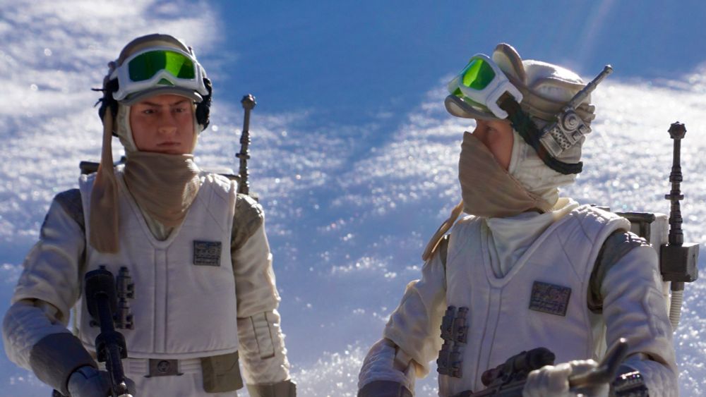 Two Hasbro Star Wars black series rebel trooper (Hoth) 6 inch action figures stand in the snow discussing their favorite recipes 