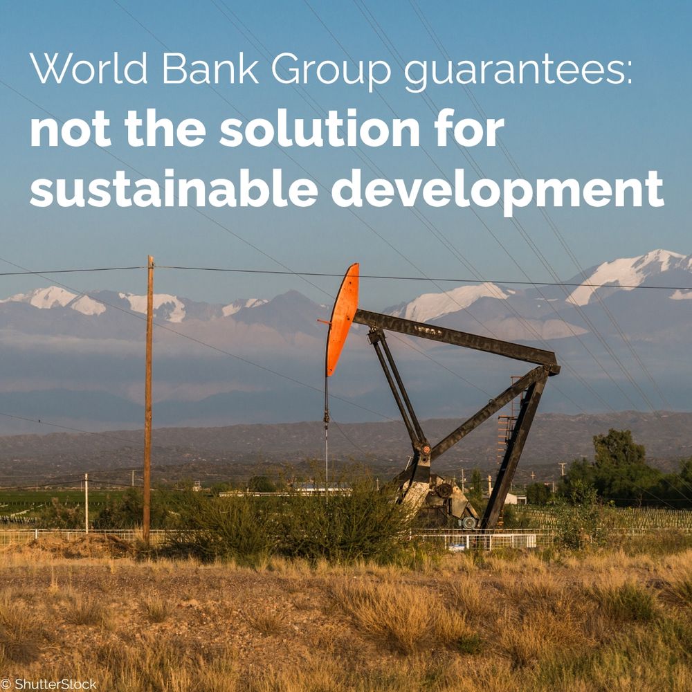 Photo of an oil pump in Vaca Muerta Argentina with Andes mountains in the background. White text overlaid "World Bank Group guarantees — not the solution for sustainable development."
