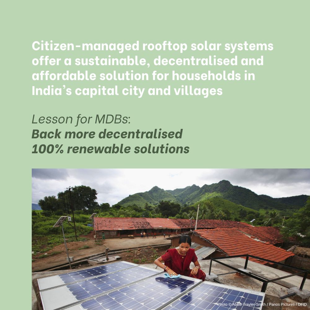 Pale green background, white and green text: "Citizen-managed rooftop solar systems offer a sustainable, decentralised and affordable solution for households in India’s capital city and villages. Lesson for MDBs: 
Back more decentralised 100% renewable solutions. 
Photo of young Indian woman wearing a sari, cleaning a solar panel, with building roofs and green mountains in the background. 