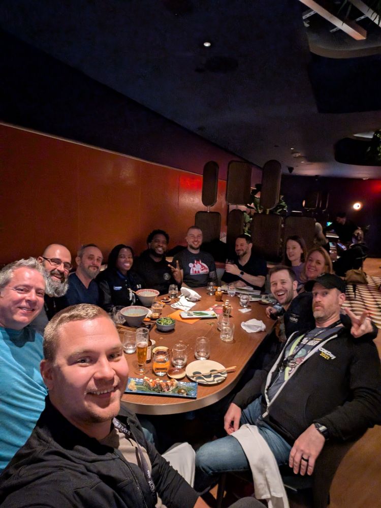 Group of dear friends at a dinner table. Except Bonig. Everyone hates Bonig. 