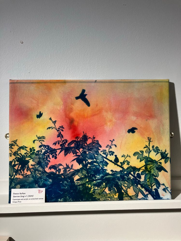 An image of birds and rose bushes 