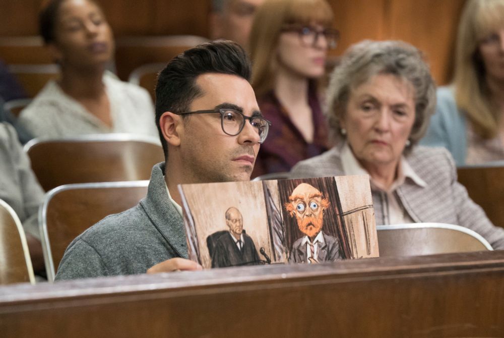 Dan Levy as a courtroom sketch artist. 