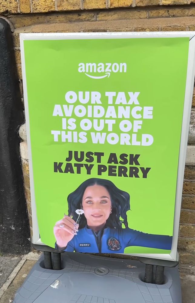 Fake Sign (bright green)

Amazon
OUR TAX AVOIDANCE IS OUT OF THIS WORLD
JUST ASK KATY PERRY