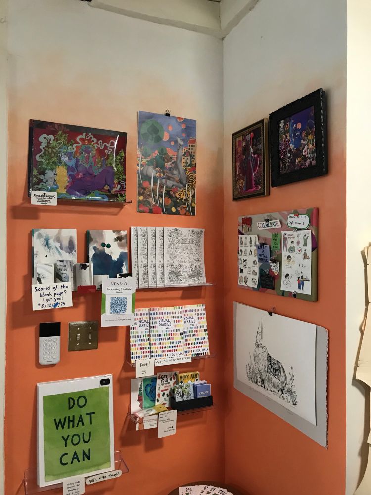 Art display of prints, zines and stickers