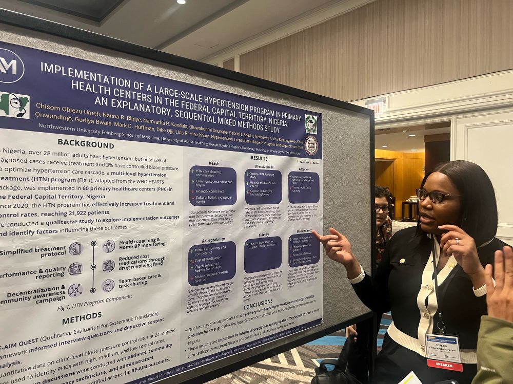 Chisom talking through a mixed methods poster 
