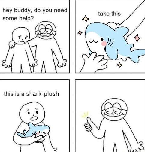 Comic of a man giving a sad man a shark plush