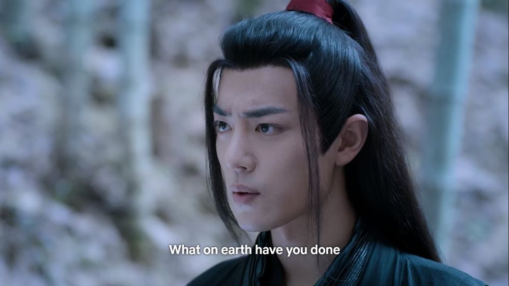 Close in shot of Wei Wuxian, brow furrowed, as he asks an offscreen Lan Wangji:

What on earth have you done
