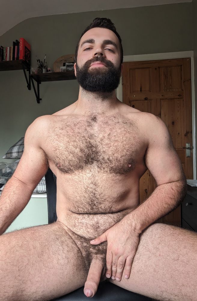 A selfie of me sitting naked in the home office. 