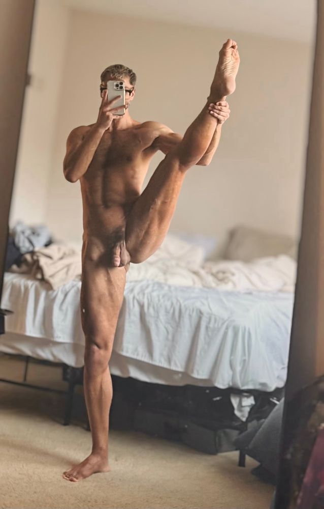 Stretching naked in my mirror 