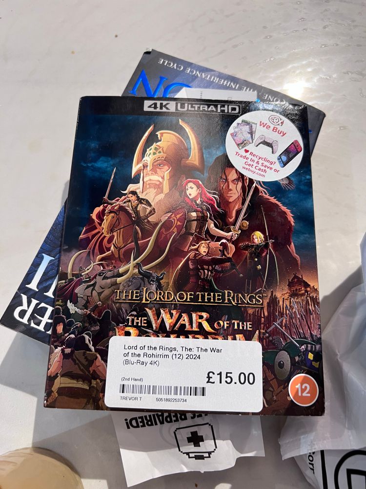 A 4K Blu-Ray box for Lord of the Rings: The War of the Rohirrim. There’s a CeX label on the top right of the box, and a label displaying the price at the bottom: ‘£15’. There’s a copy of Eragon beneath it.