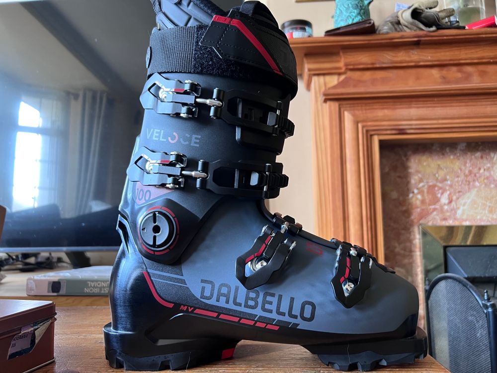 Dalbello Veloce ski boot sitting on a coffee table in a living room