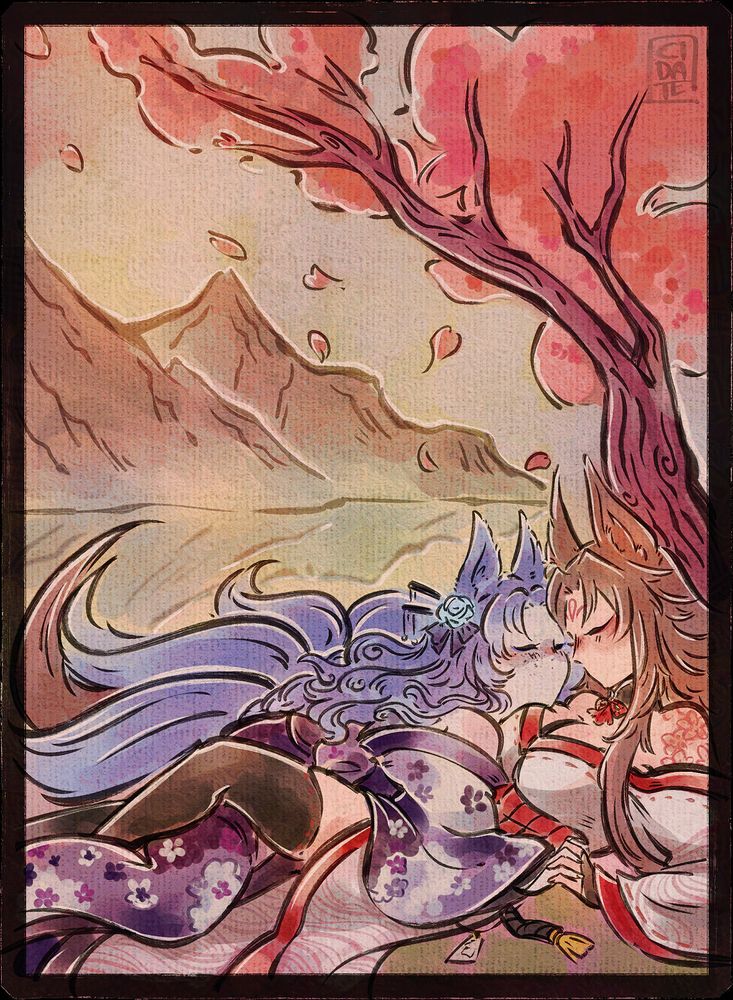An illustration in the style of the game, Okami. Two women with fox ears and multiple tails cuddle beneath a cherry blossom tree. One is dressed in a purple kimono with a floral pattern that hangs off her shoulders. Her hair is blue and curled with a floral accessory beneath one of her ears. The other is dressed in white robes that have red accents and lining. Her hair is a warm brown and her exposed shoulder shows red, floral tattoo lines. In the background you can see mountains in the distance and a lake they reflect off of.
