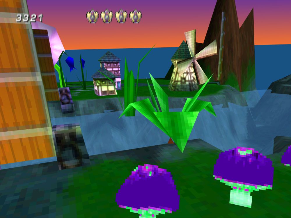 A better look at the Weedom, a green and rocky archipelago of small villages, an endless ocean and a beautiful purple-orange sunset.
There's a few buildings and a cute little windmill scattered about with huge mushrooms, plants and a drawbridge lifted up, separating the few small buildings from the rest of the landmass.

I can't say this game has the best art direction by any means, it's got that early 3D look made by people who were still sinking their teeth into the new technology, but there's something charming about that even if they didn't always succeed in their attempts.