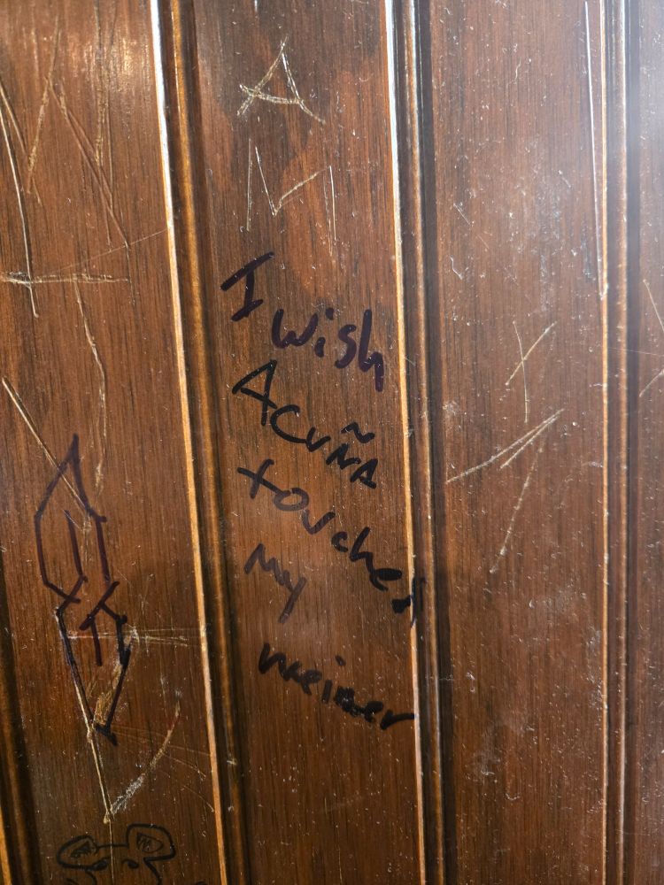 Graffiti in the Wrecking Bar men's room