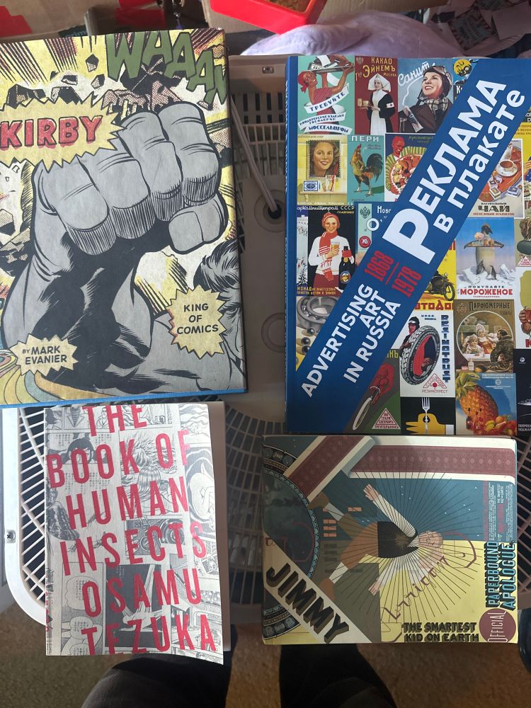 Four books: The Book of Human Insects by Osamu Tezuka; Jimmy Corrigan, the Smartest Kid on Earth by Chris Ware; Kirby King of Comics by Mark Evanier; Advertising Art in Russia 1968-1978.