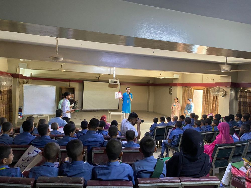 Bagh-e-Sakina teaching in a school