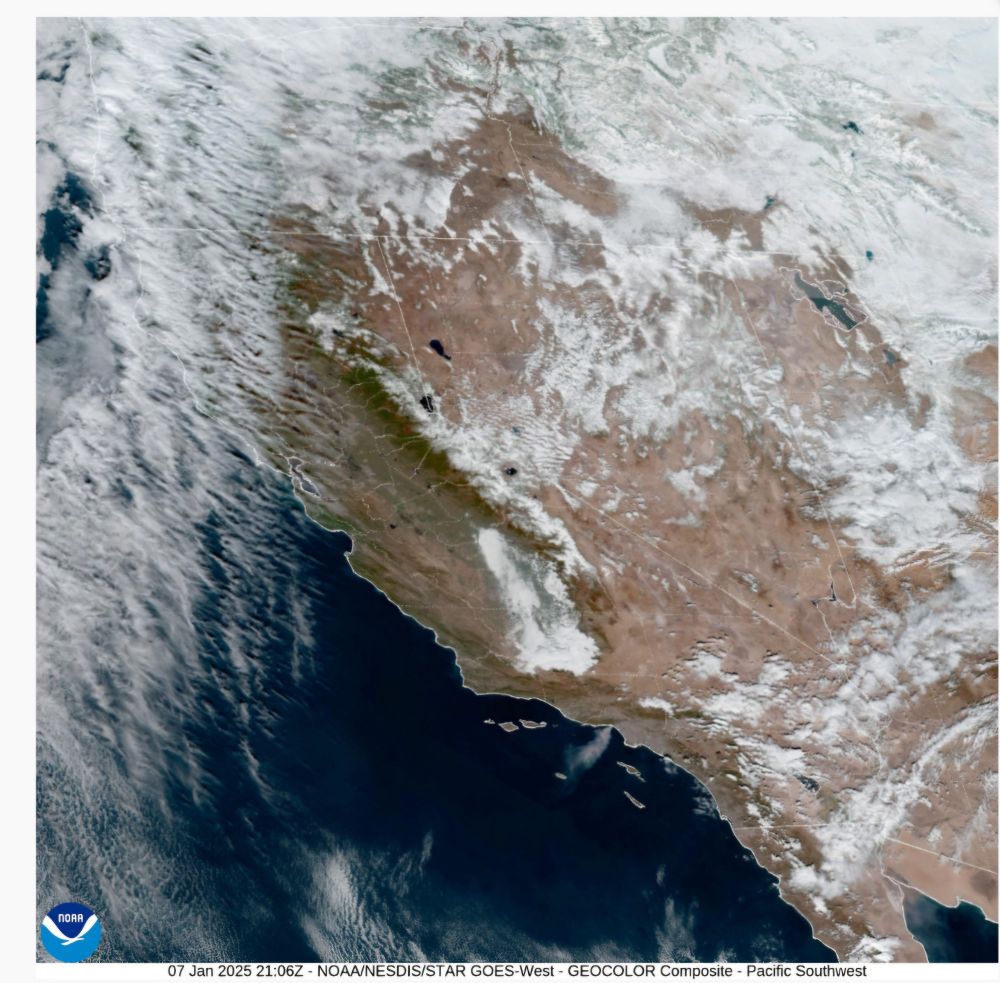 Satellite image of the west coast showing smoke from the Palisades fire drifting offshore. 