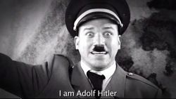 Screenshot from Epic Rap Battles of History: Darth Vader vs Adolf Hitler, of Adolf Hitler screaming: "I AM ADOLF HITLER"