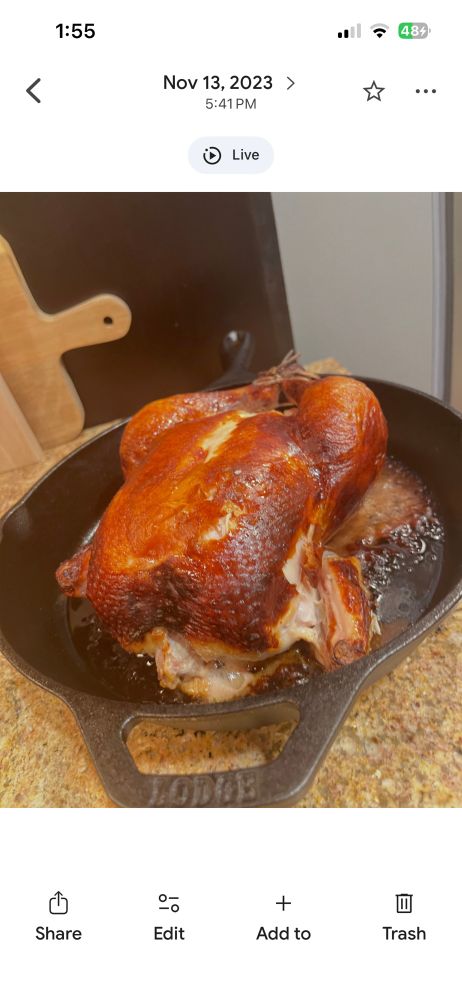 A roast chicken in a cast iron pan 