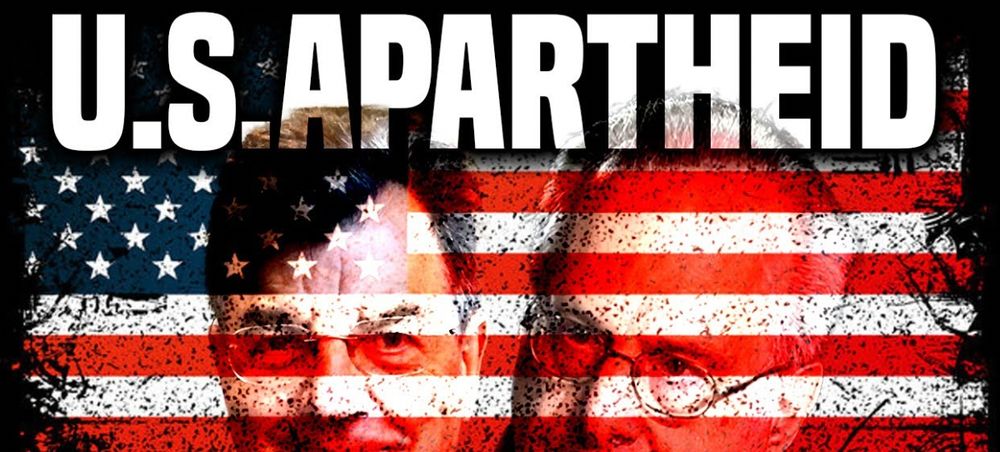 The top two thirds of the USA flag, on  black background, overlaid with two older bespectacled men's heads and titled U.S. Apartheid.