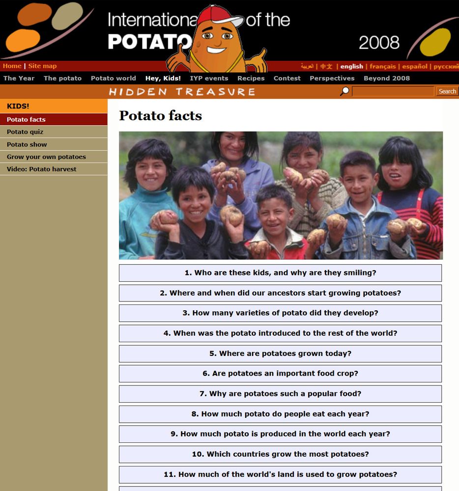 Screengrab of the website for the International Year Of The Potato 2008. This time I've clicked on "Hey Kids" and a cartoon potato wearing a baseball hat has appeared in the header. There is a photo of children holding potatoes. A header says "Potato Facts" and you can click on questions to reveal answers. Question one is "Who are these kids and why are they smiling?"