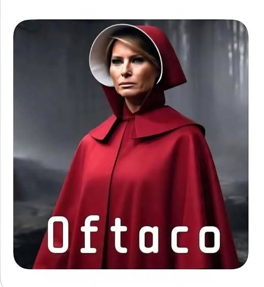 probably AI imaging -- Melania Trump in Handmaid attire of white and red bonnet and red cloak, with caption that reads "Oftaco"