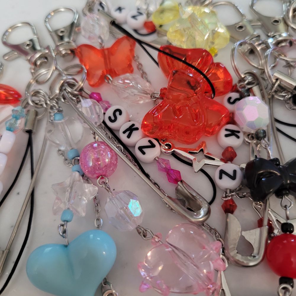 Close up imagine of several colorful beaded keychains