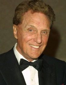 Robert Stack smiling.