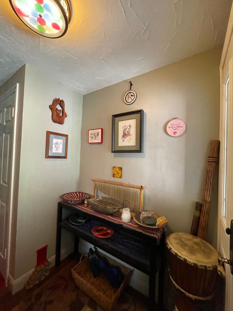 Our entryway, complete with newly installed fairy door and stairs. 