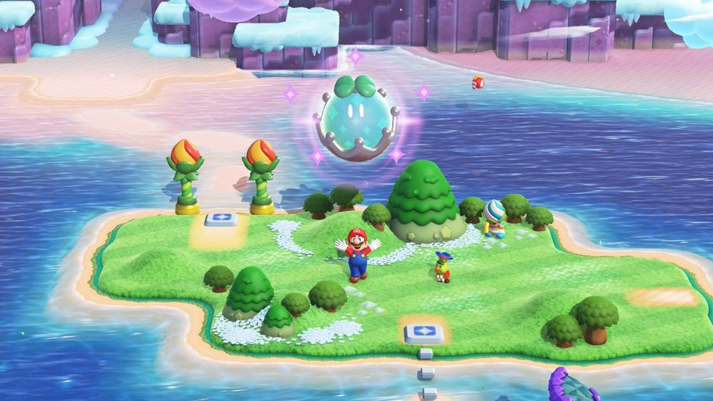 Screenshot of Mario Wonder on the Switch. Mario is standing on the over world map, on a small green island surrounded by blue sea.