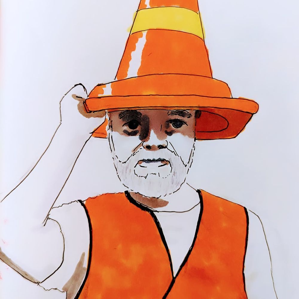 A workman disguising himself as a unicorn wearing a traffic cone