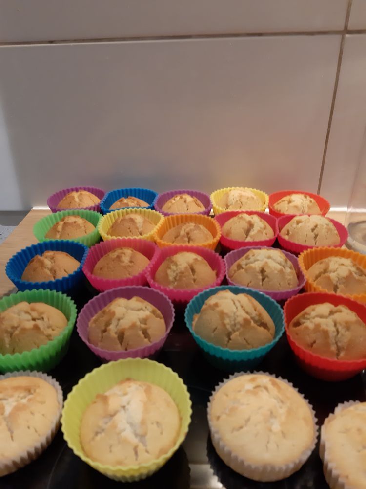Lots of muffins in colourful silicon cups
