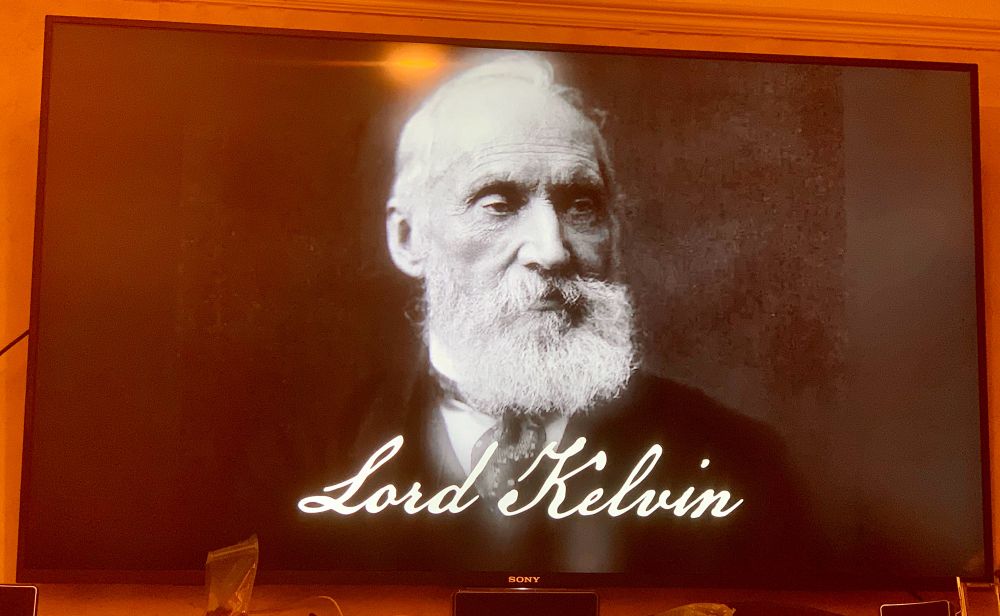 A television showing a portrait of Lord Kelvin (1824-1907). Absolute temperatures are stated in units of kelvin in Lord Kelvin's honour, and my dog is also named after him (I’ll let you decide which of those facts are the most important 🤣🐶). 