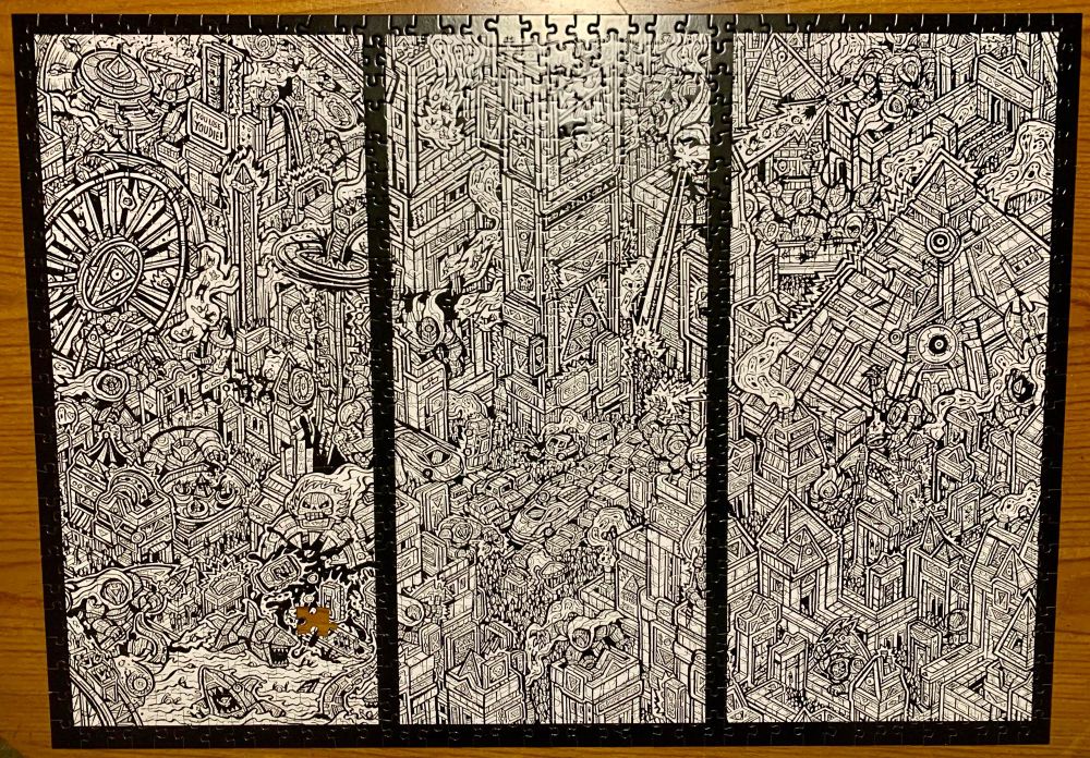 What is supposed to be a thousand piece jigsaw puzzle from dbrand, their “Robot City” pattern. Sadly, a piece appears to have gotten lost along the way, so I only have a nine hundred and ninety nine piece puzzle instead. 