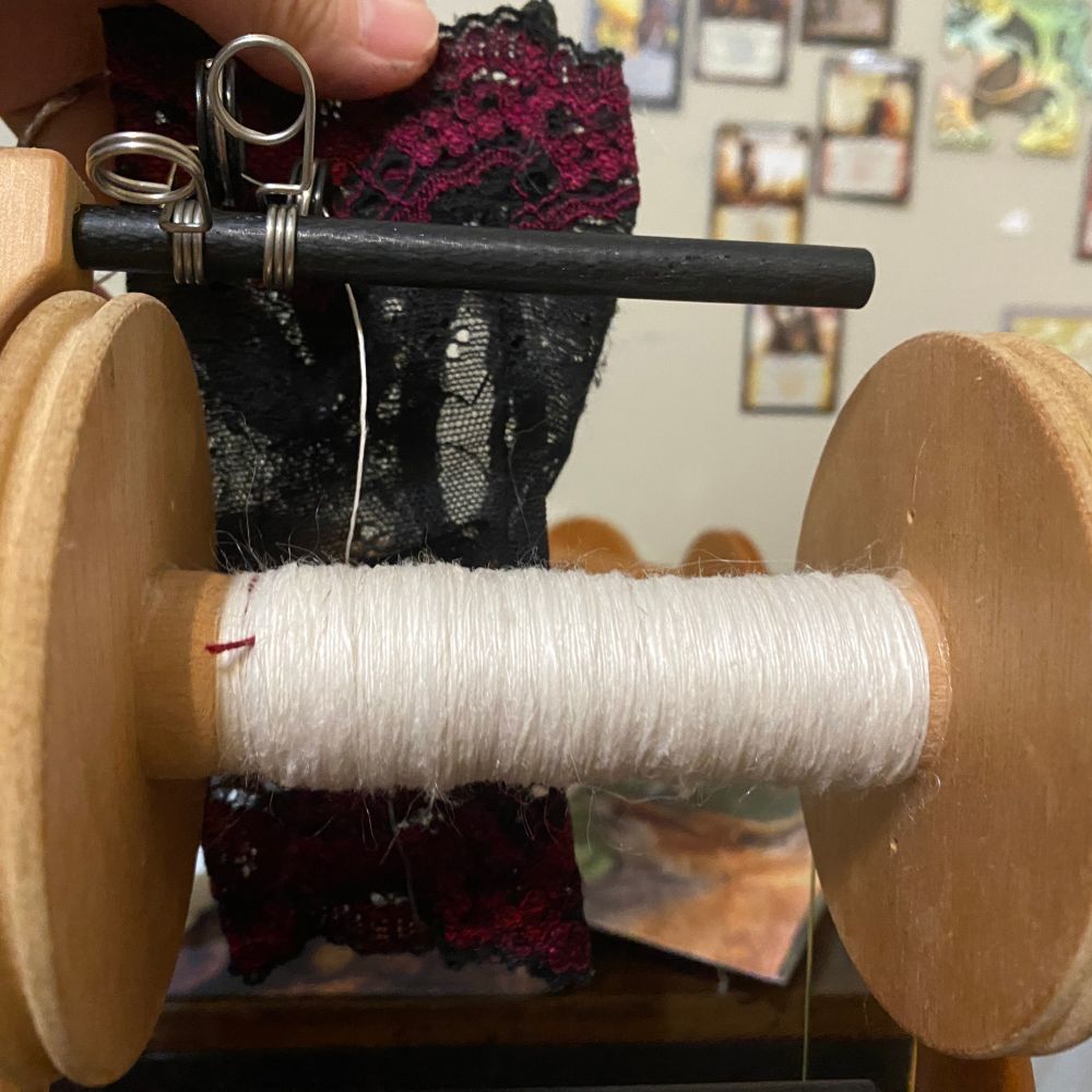 bobbin of handspun ramie WIP