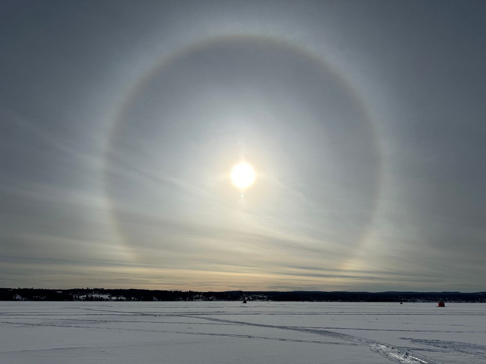 A sun dog over frozen Keweenaw Bay on Lake Superior