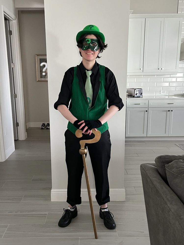 Me standing dressed as The Riddler with my cane placed in front of me