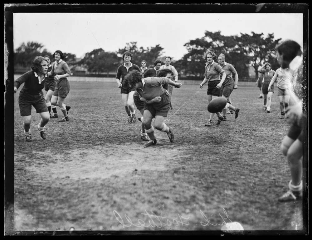 women playing rugby