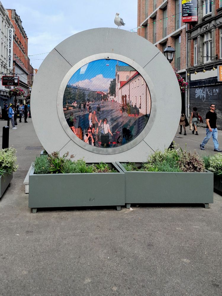 The Dublin 'portal' on North Earl street showing a live view of Warsaw in Poland