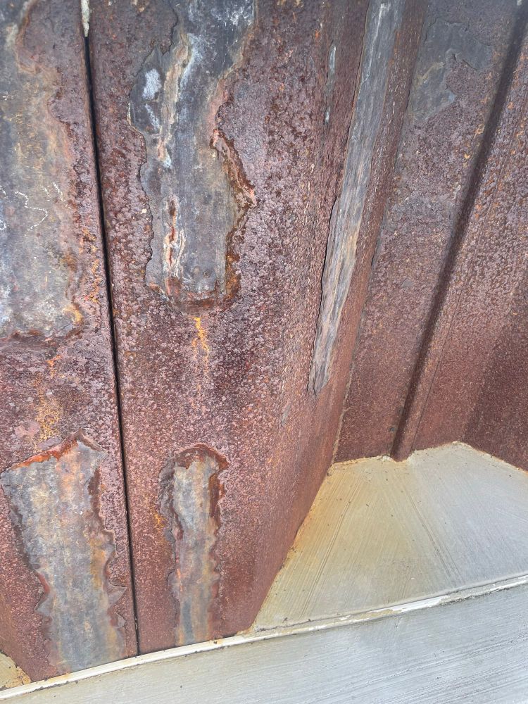 A steel sea wall, looks like maybe 100 years of rust and corrosion. Wrong! It’s only one year old. 