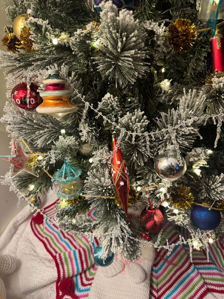 My blue spinner is an Atomic age plastic ornament that still spins!  There is a star and a calliope spinner shown here. 
